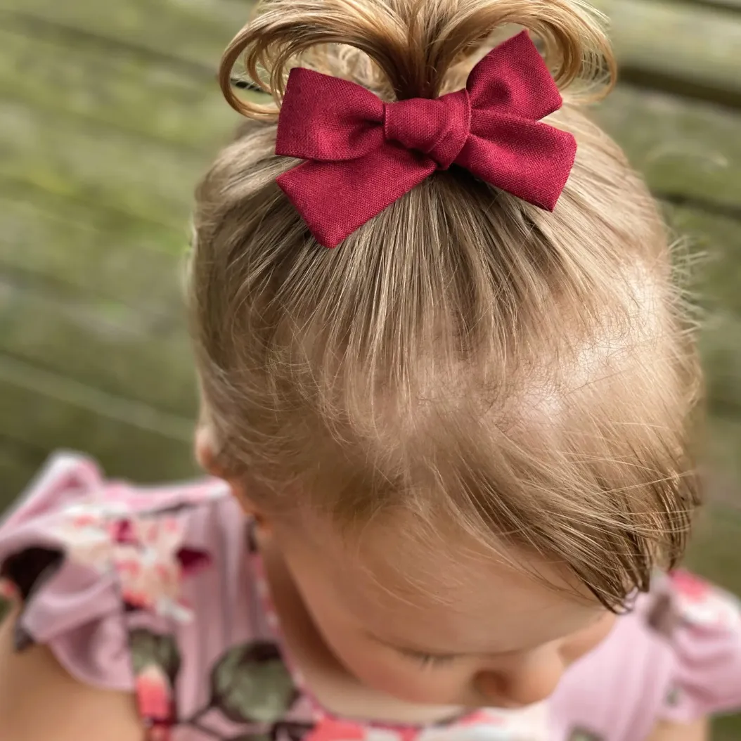 burgundy small hand-tied hair bow